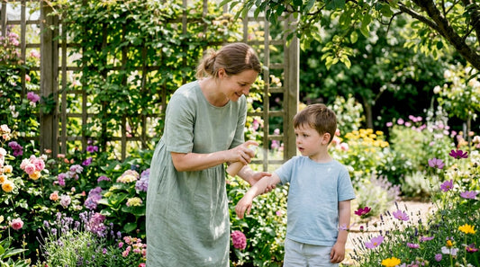 Mother safely applying DEET on child’s arms outdoors